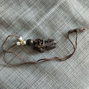 T-Rex wood skull necklace